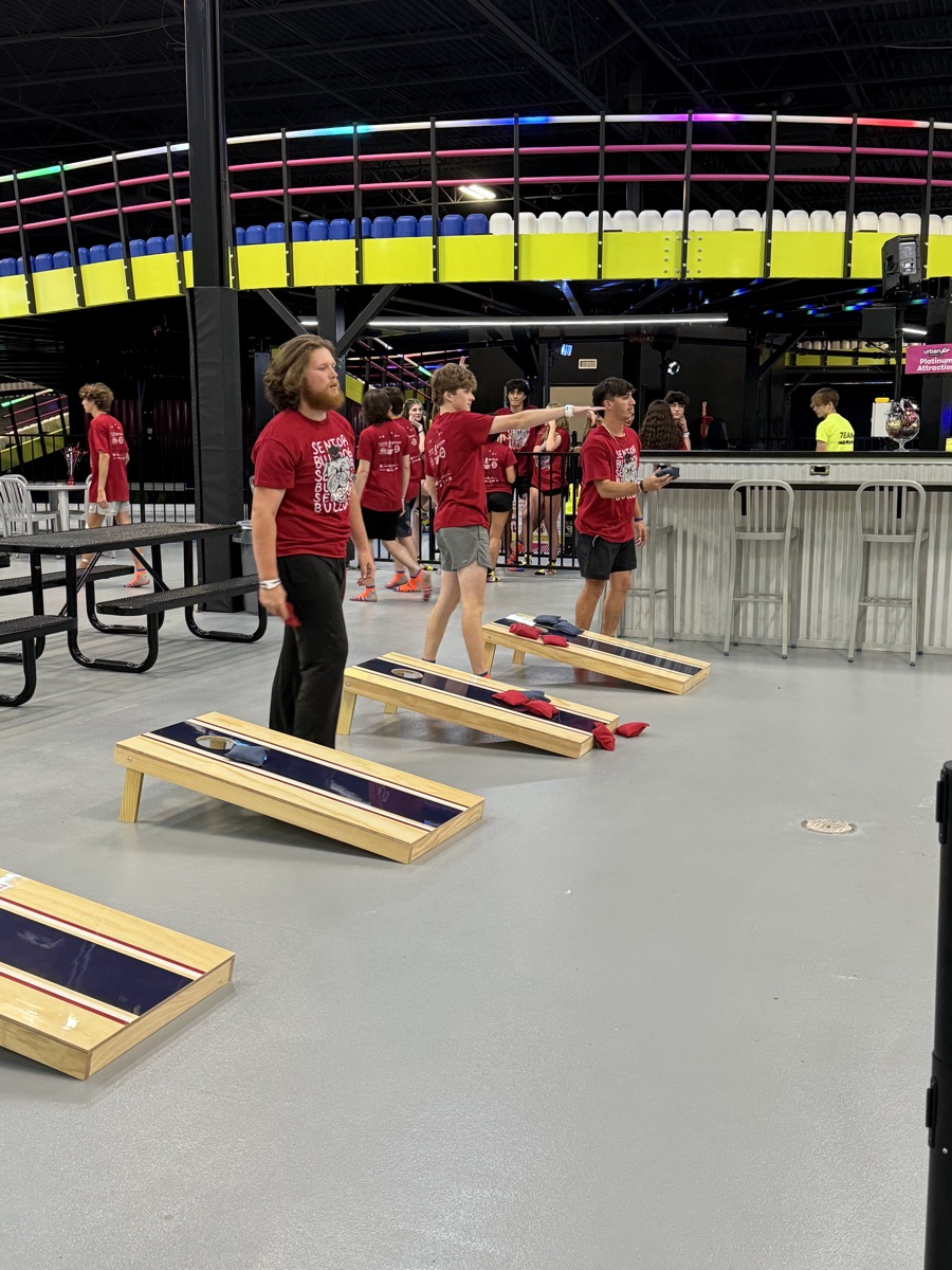 Seniors playing cornhole at Project Graduation